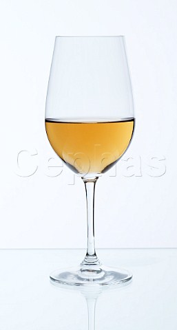 Glass of oxidized Chardonnay wine