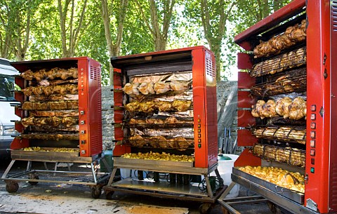 Rotisserie chickens in market at Amboise IndreetLoire France