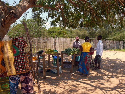 Roadside stall selling rugs fruit and vegetables Ponta do Ouro southern Mozambique