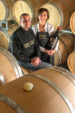 Marco and Tiziana Parusso brother and sister in the barrel cellar of Parusso Monforte dAlba Piemonte Italy Barolo