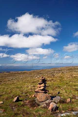 Tourist cairn at summit of Bealach Na Ba  Applecross Peninsula Ross and Cromarty Scotland