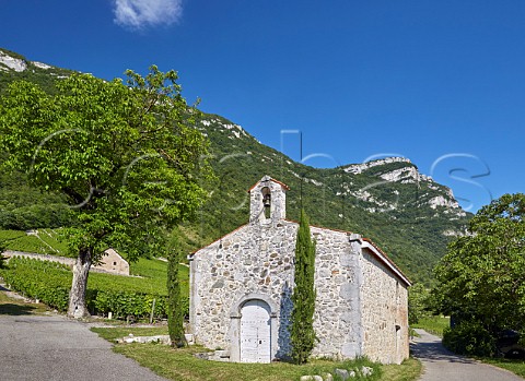 Chapel in the vineyards below Les Bauges mountains Chignin Savoie France