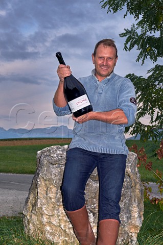 Philippe Hritier of Domaine des Orchis with a Jeroboam of Mondeuse the rock was removed from his vineyard Poisy near Annecy Savoie France