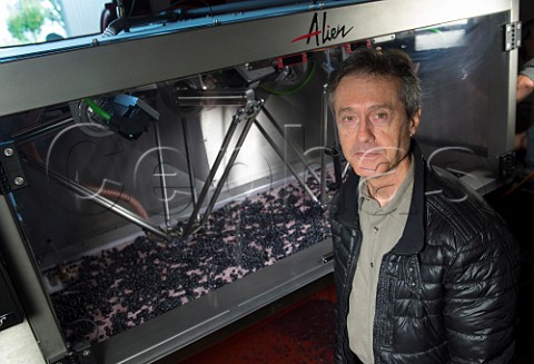 Jol Gallet inventor of Alien a robotic triage machine for sorting grapes Here installed at Chteau HautBailly Lognan Gironde France PessacLognan  Bordeaux