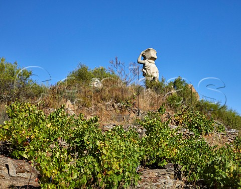 Statue of a grape picker by old terraced vineyard in the valley of the Ro Sil  Doade Galicia Spain  Ribeira Sacra  subzone Amandi