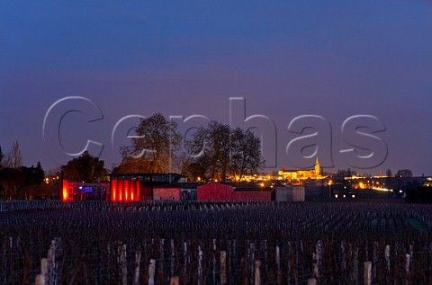 Chteau la Dominique at dusk with the town of Stmilion in distance Gironde France Saintmilion  Bordeaux