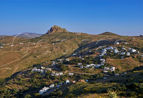 White villages of Triantaros and Arnados with Mount Exomvourgo beyond Tinos Greece