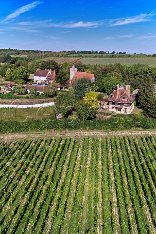 Vineyards of Silverhand Estate Solaris in foreground surround the village of Luddesdown with its Manor House Church and Court Lodge Gravesham Kent England