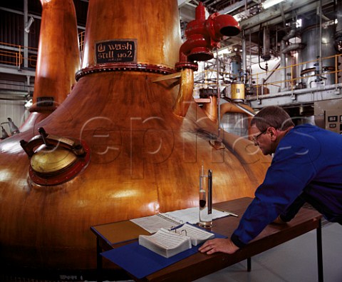 Recording the alcohol level of spirit in the Still  Room at Midleton Whiskey Distillery Midleton County Cork Ireland