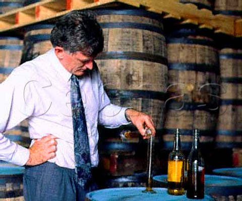 Barry Crockett Head Distiller makes an impromptu   blend of whiskeys from barrel Note the different   colours of the samples   Midleton Distillery   Midleton County Cork Eire