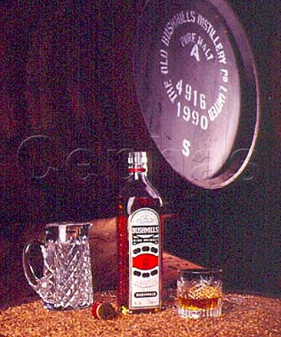 Bottle and glass of Bushmills Whiskey in warehouse   of Old Bushmills Distillery Bushmills CoAntrim   Northern Ireland