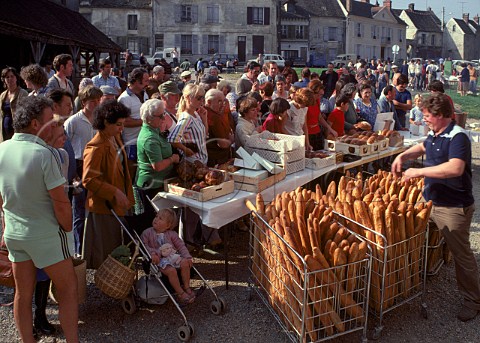 Bread stall in Sunday market at   MarignyenOrxois Marne France
