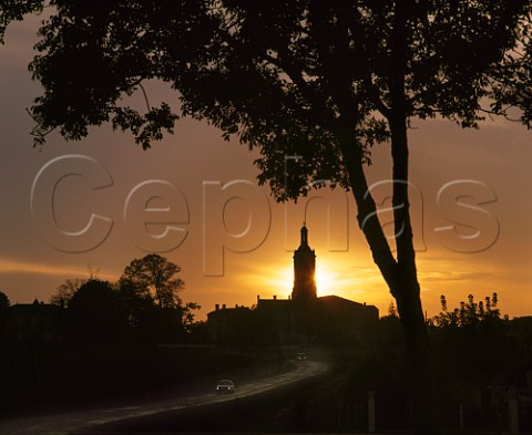 Sunset over Chteau Capbern Gasqueton and the church at StEstphe Gironde France   Mdoc  Bordeaux