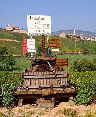Old grape press in StVerand advertises the wines of   Domaine de Fontenay SaneetLoire France   Mconnais  Beaujolais