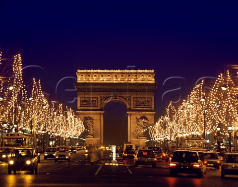 Christmas lights on the Champs Elyses and the Arc  de Triomphe Paris France