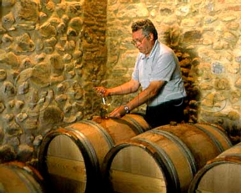 Tasting Juranon Moelleux from new oak barriques   in the cellars of Chteau Jolys Gan   PyrnesAtlantiques France