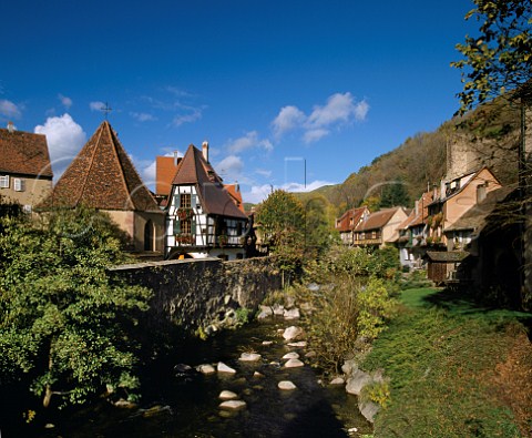 Timbered houses by the Weisbach river in the wine town of Kaysersberg HautRhin France  Alsace