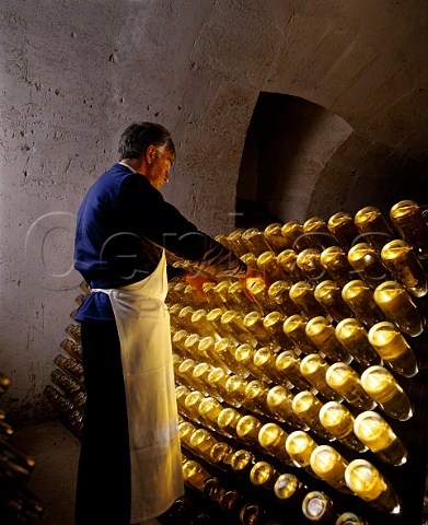 Performing the remuage on bottles of Cristal    champagne in the cellars of Louis Roederer   Reims Marne France