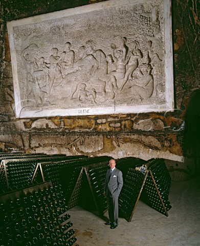 Prince Alain de Polignac a direct descendant of Madame Pommery in the cellars below a fresco by Henri Navlet Champagne Pommery  Greno Reims France