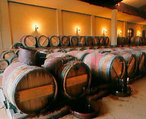 Racking barrels of 2ndyear wine in the chai of   Chteau Palmer Cantenac Gironde France  Margaux  Bordeaux