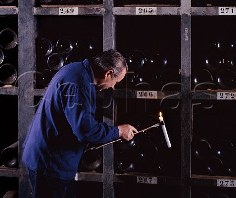 Examining Jeroboams of 1983 in the vintage  bottle cellar of Chteau Latour  Pauillac Gironde France  Mdoc  Bordeaux