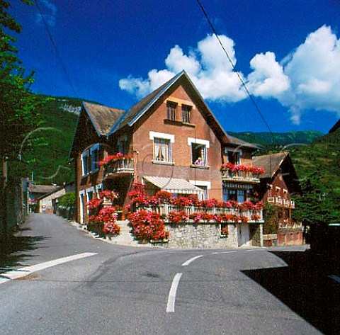 Geraniumcovered house in the wine village of Cruet   Savoie France     Vin de SavoieCruet