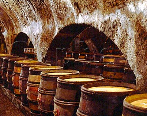 Empty barrels await filling with the new vintage in   the cellar of Louis Latours Chateau de Grancey at   AloxeCorton Cote de Beaune