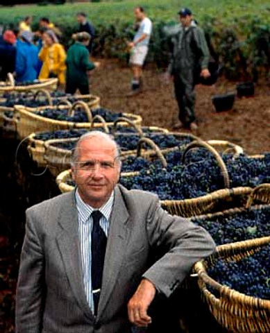 Louis Latour with baskets of Pinot Noir grapes   from Les Perrires vineyard around his   Chteau de Grancey AloxeCorton  Cte dOr France     Cte de Beaune