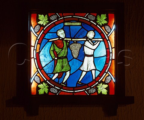Stained glass decoration depicting the Israelite   spies carrying the huge bunch of grapes from the   Promised Land   Champagne Vilmart   RillylaMontagne Marne France