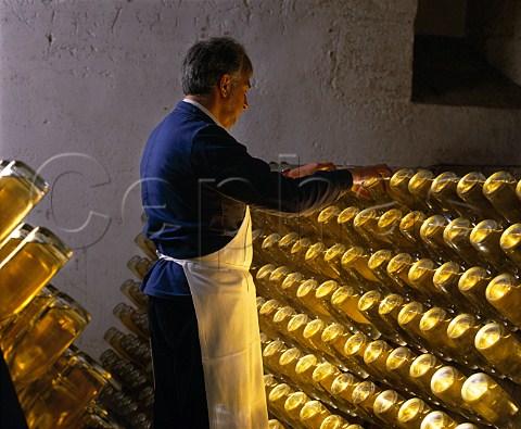 Performing the remuage on bottles of Cristal   champagne in the cellars of Louis Roederer   Reims Marne France