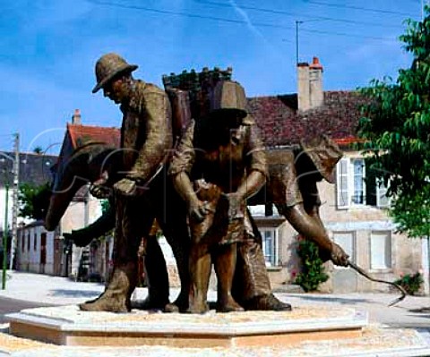 Sculpture showing the different tasks required in   the vineyard PulignyMontrachet Cte dOr France