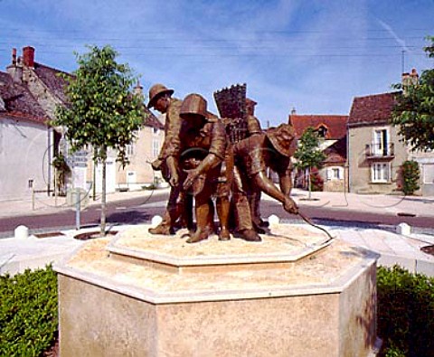 Sculpture showing the different tasks required in   the vineyard PulignyMontrachet Cote dOr France