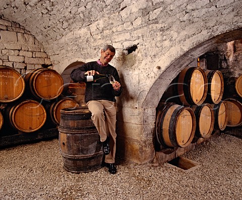 Michel Laroche in the 9thcentury cellars of the   Obediencerie the headquarters of Domaine Laroche in   Chablis Yonne France