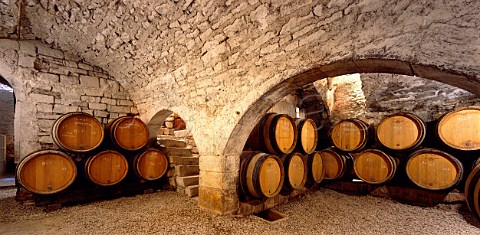 Barrels in the 9thcentury cellars of the   Obdiencerie the headquarters of Domaine Laroche  in Chablis Yonne France