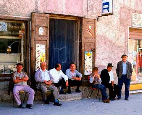 Men outside bar   Brienza Basilicata Italy