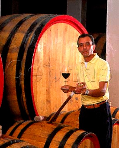Donato dAngelo tasting wine from barrel  Rionero in Vulture Basilicata Italy Aglianico del Vulture