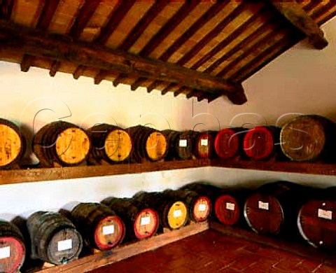 Barrels of Vin Santo ageing in a loft at   Castello di Volpaia Volpaia Tuscany Italy