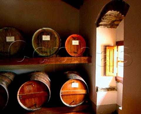 Barrels of Vin Santo ageing in a loft at   Castello di Volpaia Tuscany Italy