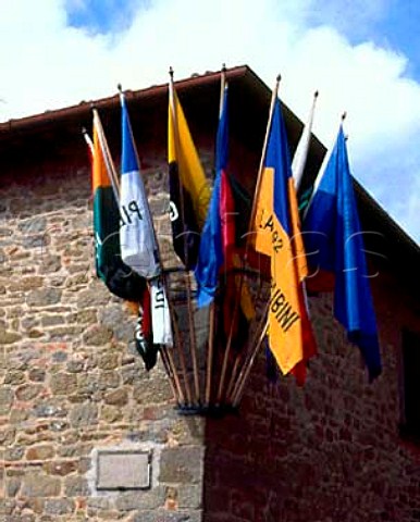 Flags celebrate a music festival organised by   Castello di Volpaia in the the medieval village of   Volpaia Tuscany Italy    Chianti Classico