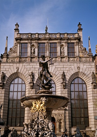 The Fountain of Neptune with the Court of Artus behind Gdansk Poland