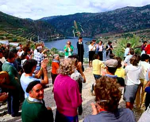 Alistair Robertson holding the Rama and his wife Gillyane at the end of harvest celebration at Taylors Quinta de Vargellas high in the Douro Valley east   of Pinho Portugal    Port