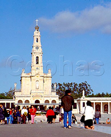 Fatima Portugal  Penitents walking on their knees to the Chapel of   the Apparitions The plaza with the Basilica at the   top can hold over 1000000 people