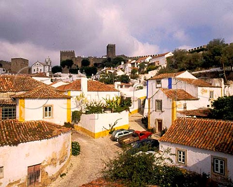 The walled town of Obidos Estremadura Portugal Known as The Wedding City it was the traditional bridal gift of the kings of Portugal to their queens a custom begun   in 1282 by Dom Dinis and Dona Isabella