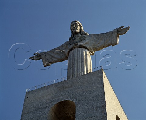 The huge statue of Christ situated across the Tagus  estuary from Lisbon Portugal