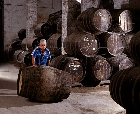 Rolling sherry barrel through La Palma bodega of   Osborne Puerto de Santa Maria Andaluca Spain    Sherry