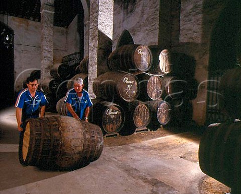 Rolling barrel of sherry through La Palma bodega of   Osborne Puerto de Santa Maria Andaluca Spain    Sherry