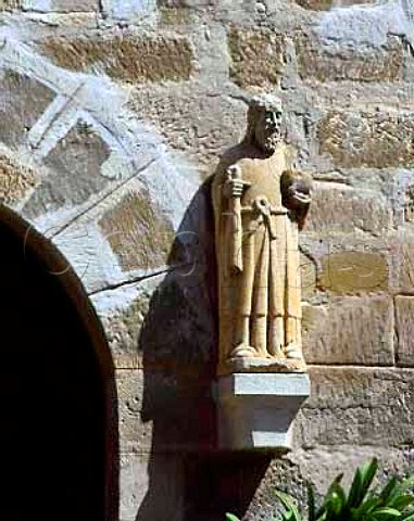 Figure by the entrance to the 17th century Castle of   Raimat west of Lerida Catalonia Spain