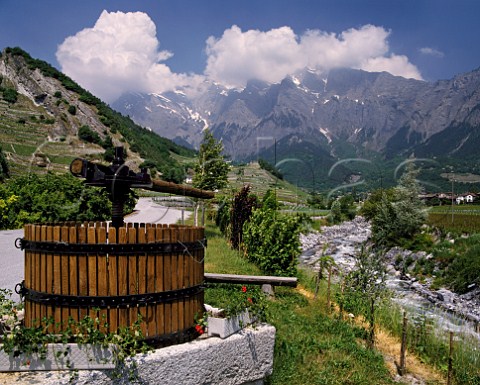 Vineyards and old grape press by mountain stream   Chamoson Valais Switzerland