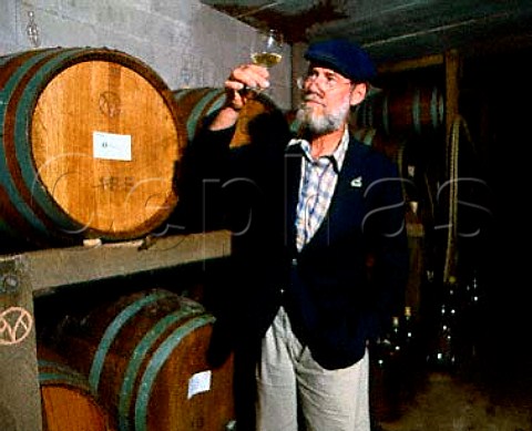 Arnulf Esterer of Markko Vineyard tasting his   Chardonnay from oak barrique Conneaut Ohio   Lake   Erie