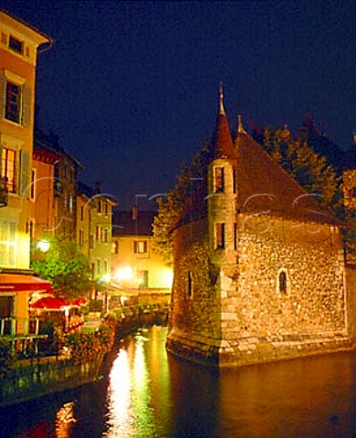 The Palais de lIsle at night used as a residence   in the 12th century and later as a prison Built on   an island in the Canal du Thiou in Annecy near   Geneva   HauteSavoie France RhneAlpes